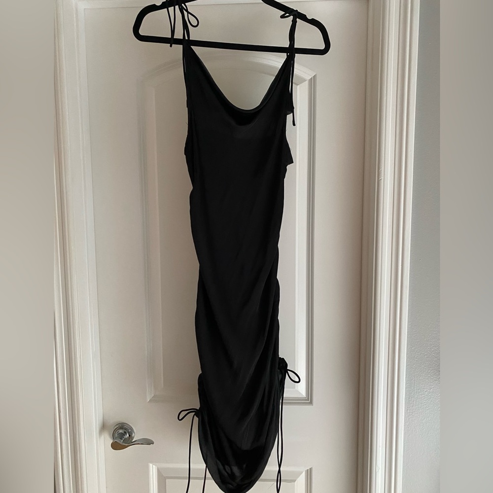 Black cowl neck slip dress with drawstring adjustable sides